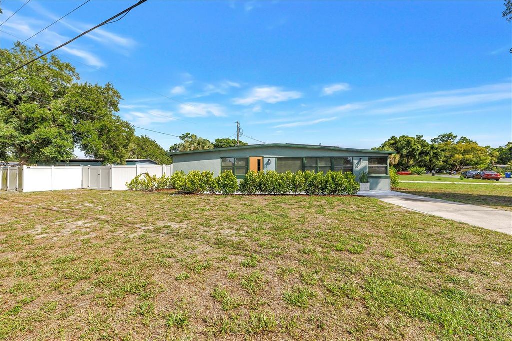 Photo of 7599 Meadowlawn Drive N, St Petersburg, FL 33702 (MLS # TB8513107)