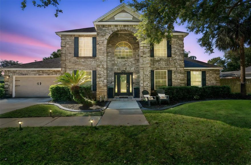 Welcome to your new home in Remington Park, Oviedo. This elegant five-bedroom home offers the perfect blend of comfort and style, thoughtfully designed for both everyday living and entertaining. Set on a desirable corner lot with a spacious front yard, the home makes a warm first impression. Inside, the formal dining room and a versatile front bedroom—ideal as a home office or study—set the tone for the well-planned layout. At the heart of the home, the open living room and kitchen overlook the screened-in pool and lanai, creating an effortless flow between indoor and outdoor living. The living room features generous space and a cozy fireplace, while the kitchen offers granite countertops, a breakfast bar, tile backsplash, pantry, and a bright dining nook. The primary suite is a peaceful retreat with a sitting area overlooking the pool, direct patio access, and a beautifully updated bath featuring dual quartz-topped vanities, a soaking tub, and a separate shower. Upstairs, a large loft provides additional living space, along with three bedrooms and an updated full bath. Step outside to enjoy the screened pool and covered lanai—perfect for relaxing or entertaining—and a privacy-fenced backyard with plenty of green space to play or garden. The roof was replaced in 2019. As a resident of Remington Park you will enjoy access to Lake Hayes, Basketball Courts, Pickleball Courts and a playground. Remington Park offers a prime Oviedo location close to SR 417, UCF, Research Park, Seminole State College, and Oviedo on the Park with great restaurants, shopping, and community events. With top-rated schools and an easy drive to the beaches and attractions, this is Central Florida living at its best. Schedule your private showing today and experience all this home has to offer.