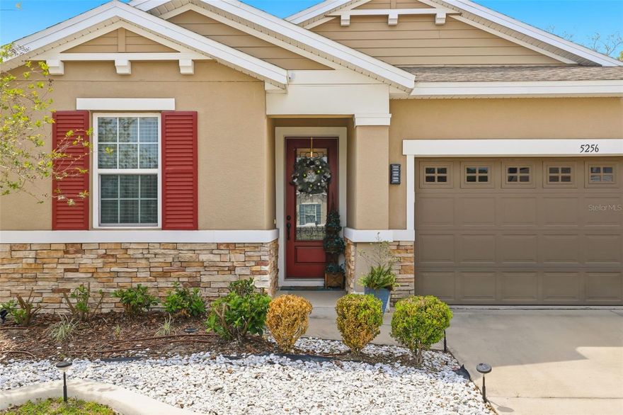 Welcome to 5256 Meadow Song Drive in Okahumpka—where modern elegance meets effortless living. This exceptional 4-bedroom, 2-bath residence shows like new construction and is thoughtfully enhanced with high-end upgrades that blend comfort and style.
From the moment you enter, you’re greeted by a light-filled, open-concept layout that seamlessly blends sophistication and functionality. The main living space is anchored by a custom-built-in fireplace, creating a striking focal point and an inviting atmosphere perfect for both intimate evenings and upscale entertaining.
The heart of the home flows beautifully into the dining and kitchen areas, offering a refined yet comfortable space ideal for hosting and everyday living. Step outside to your private outdoor retreat—complete with a screened enclosure and an expansive 18x24 extended concrete patio, thoughtfully designed for year-round elevated outdoor entertaining, dining, and relaxation.
Each bedroom offers generous space and versatility, while the primary suite provides a serene escape with privacy and comfort.
This is more than a home—it’s a lifestyle upgrade that offers the look and feel of new construction without the wait.
Ideally located with convenient access to major roadways, shopping, and dining, this home delivers both accessibility and a tranquil residential setting.