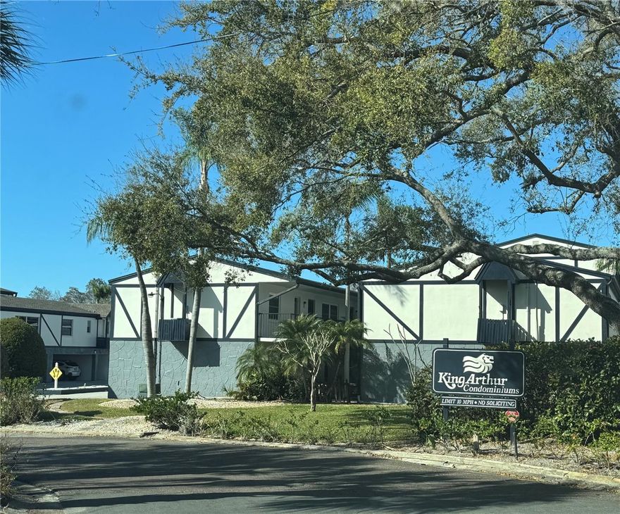 This Condo is located in the King Arthur’s Court community. It is a second floor, corner unit. It features two bedrooms & two bathrooms. The  Primary suite has a walk-in closet and ensuite bath with shower. The guest room has access to the second bath and a wall closet. This unit is spacious and has an open floor plan with a cute kitchen off main living area. Lots of natural light throughout. This condo can use some of your own personal touches. You have covered parking under a Carport with one space and a storage room #13. The building has an elevator. 
There is also a nice community pool and tennis courts. Great Location! Shopping, Medical, Food & Entertainment close by. Beautiful Beaches are 15 minutes away. Tampa airport and Saint Pete airport are within 20/30 minutes away..