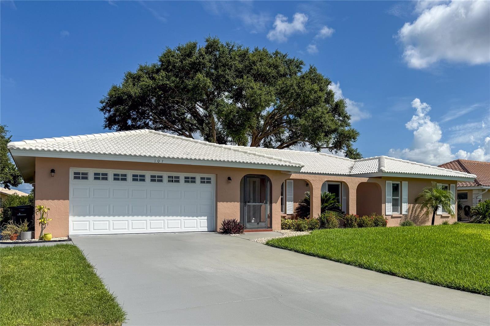 Welcome to 107 Corot Drive, a beautifully renovated pool home tucked away in the highly desirable community of Sorrento East in Nokomis. This spacious 3-bedroom, 2.5-bath home also features a versatile office or den with French doors, perfect for remote work or creative space. Recent upgrades throughout give this home a fresh, modern feel, from the brand new white shaker-style kitchen with granite countertops and new appliances to the wood-look luxury vinyl plank flooring that runs seamlessly throughout the home. The primary suite offers a luxurious retreat with a large walk-in closet with it's own window, allowing for natural light, and a custom-tiled, multi-head walk-in shower. Step outside to your private covered lanai and enjoy the Florida lifestyle with a sparkling, huge swimming pool and an oversized backyard that’s perfect for entertaining or could easily be fenced for even more privacy. The home sits on a generous 0.32-acre lot and includes a two-car garage with ample space and solid storage. Every major system has been updated: new HVAC, new ductwork, new water heater, new plumbing, new IMPACT WINDOWS and DOORS, new irrigation system, new washer and dryer, and new gutters. The roof was professionally cleaned and sealed in 2024, the pool deck has been resurfaced, and the front lawn has been resodded for a polished finish. Located on a quiet street with low HOA fees of just $150 annually and no lease restrictions, this property offers both freedom and flexibility. And just a short drive to the beach, shops, and restaurants, this move-in ready home is truly a rare find.