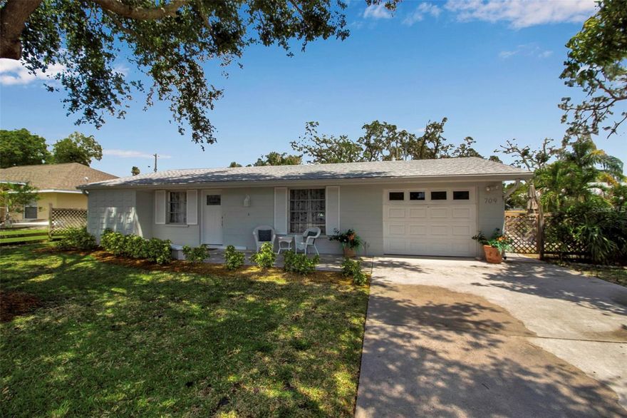 Welcome to your beautifully updated home in the heart of Northwest Bradenton! This charming residence seamlessly blends classic Old Florida style with modern comfort, all in an unbeatable location. Nestled just minutes from the pristine beaches of Anna Maria Island, the scenic trails of Robinson Preserve, and the serene waters of Palma Sola Bay. Inside, you will find an open-concept layout filled with natural light, perfect for both everyday living and entertaining. The modern kitchen is a showstopper, featuring classic neutral-toned cabinetry, striking granite countertops, stainless steel appliances, and a stylish subway tile backsplash, offering both elegance and functionality for all your culinary needs. This home features three spacious bedrooms and two beautifully updated bathrooms, including a private en-suite that adds comfort and convenience for family, guests,or the tenants of a profitable Airbnb. Step outside to your enclosed screen porch, an ideal spot to unwind with a good book and enjoy the gentle Florida breeze. The expansive, fenced-in backyard offers endless possibilities, including space for a custom pool and room to park your boat or RV, plus plenty of room for entertaining and outdoor activities. NO HOA and NO Deed Restrictions make this property a rare find in a highly sought-after neighborhood. Enjoy walkable access to Robinson Preserve’s nature trails and kayak launches or take a quick trip to De Soto National Memorial. You are just minutes from Spectacular Gulf Beaches and vibrant Downtown Bradenton, home to the Riverwalk, farmers markets, live music, art galleries, and waterfront dining. Top-rated schools, GT Bray Park, and public boat ramps are all close by! Do not miss your chance to own this exceptional home in one of NW Bradenton’s most desirable communities! This is Florida living at its absolute best!