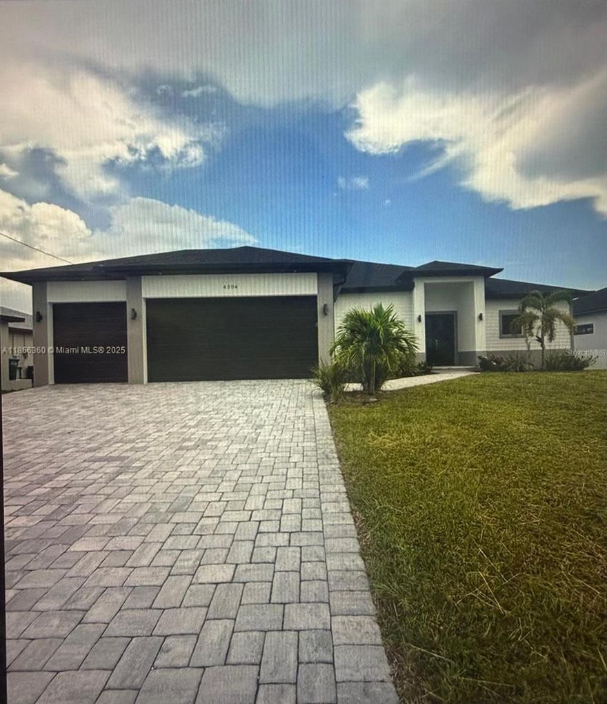 Your Cape Coral dream starts here! Steps from the future Seven Islands Project this brand-new home offers spacious, high-end modern living-room for a sparkling pool, your BBQ paradise, and high-impact doors for safety and style. The lifestyle you've been waiting for is ready-are you?