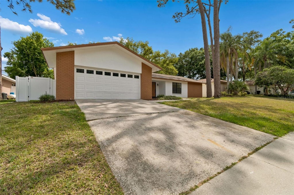 Photo of 3431 Deerfield Lane, Clearwater, FL 33761 (MLS # TB8520151)