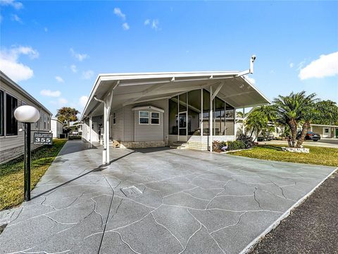 Photo of 355 Gracie Avenue N, Frostproof, FL 33843 (MLS # TB8468500)