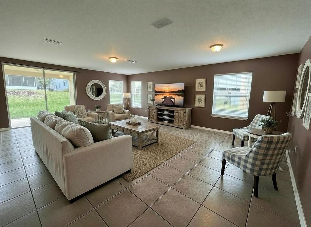 Photo of 5909 Windsong Oak Drive, Leesburg, FL 34748 (MLS # O6411614)