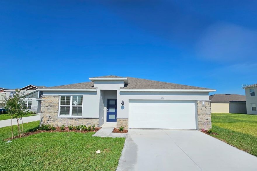 Welcome to 467 Talisi Loop, a beautifully designed 4-bedroom, 2-bathroom single-family home located in the sought-after Summerly community of St. Cloud, Florida. This spacious residence offers 1,828 square feet of living space with an open-concept layout that seamlessly connects the living, dining, and kitchen areas. The kitchen features sleek Silestone countertops, stainless steel appliances, and a large island perfect for entertaining. The primary suite includes a walk-in closet and a dual vanity bathroom, while the additional bedrooms provide flexibility for guests, family, or a home office. Enjoy outdoor living on the covered lanai and take advantage of the attached 2-car garage for added convenience. Smart home technology is integrated throughout, allowing remote control of lighting, thermostat, and more. Located just minutes from Lake Nona, major highways, and top-rated schools, this home combines modern comfort with suburban tranquility. Residents also enjoy access to community amenities including a resort-style pool, playground, and scenic sidewalks. This property is move-in ready and ideal for those seeking style, space, and convenience in a vibrant neighborhood.