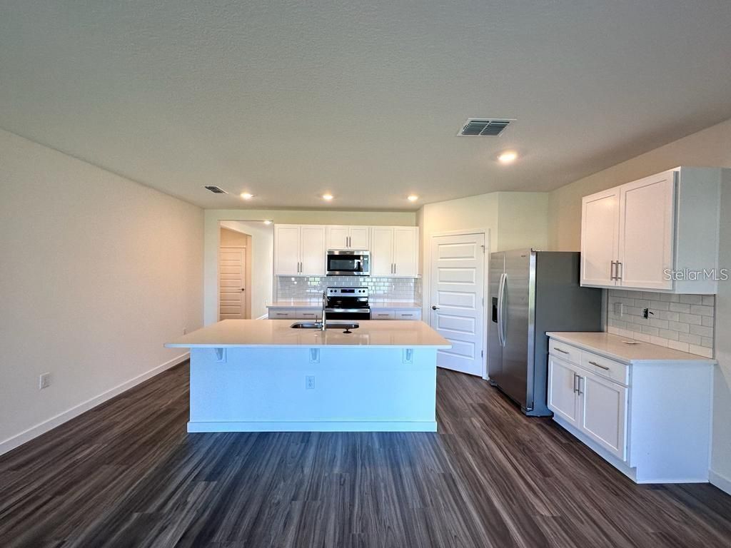 Photo of 467 Talisi Loop, Saint Cloud, FL 34771 (MLS # O6351260)