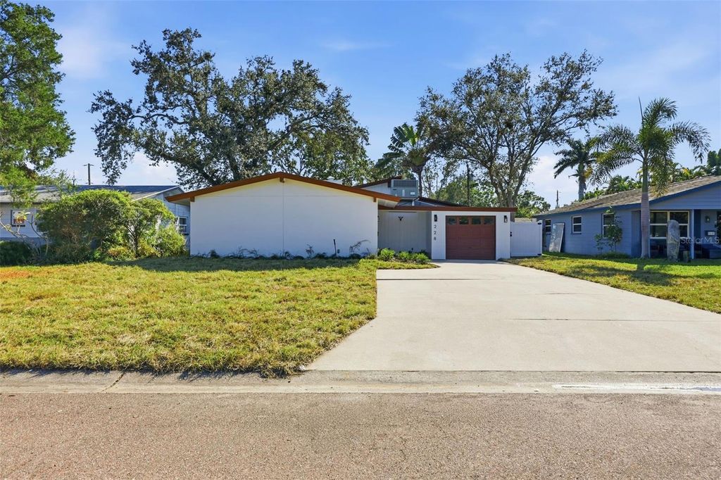 Photo of 228 87th Avenue NE, St Petersburg, FL 33702 (MLS # TB8450115)