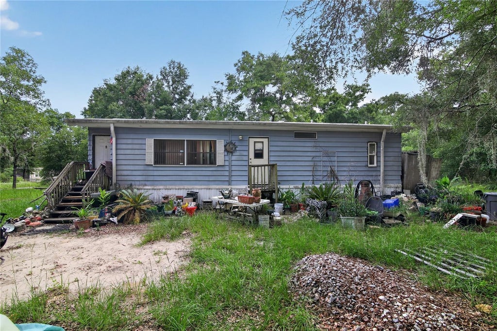Photo of 550 NE 154th Avenue, Williston, FL 32696 (MLS # O6415447)