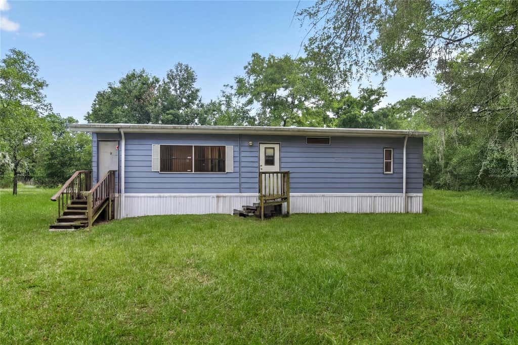 Photo of 550 NE 154th Avenue, Williston, FL 32696 (MLS # O6415447)