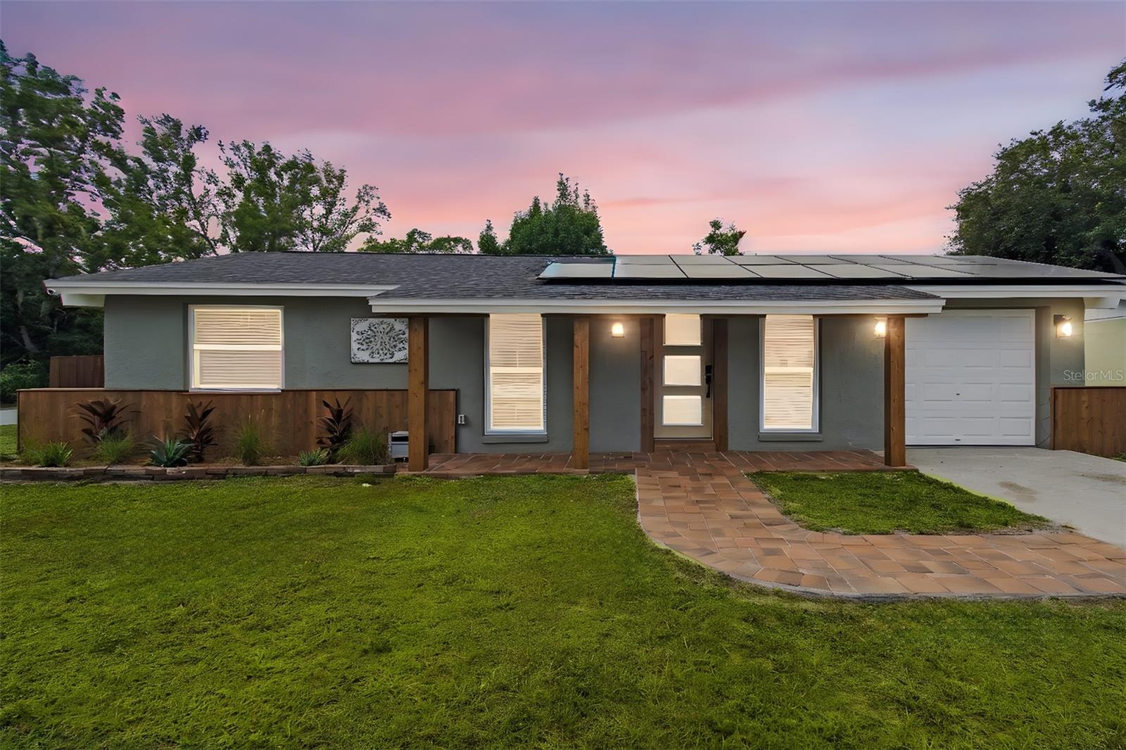 Rare Executive oversized completely renovated Solar home. This fantastic corner-lot sits adjacent to a gorgeous park with access to miles of biking, hiking and playgrounds. This home has ALL New 2022 Hurricane Windows, AC split Systems. SOLAR POWER. and Roof! This is a turn-key home that showcases: NEW CHEFS KITCHEN, TOP OF THE LINE STAINLESS STEEL APPLIANCES, EXOTIC QUARTZ COUNTERTOPS, GORGEOUS REMODELED BATHROOM WITH DUAL SINKS, NEW TILED BATH, AND MODERN LIGHT FIXTURES AND CUSTOM FINISHES THROUGHOUT. Huge master suite with two walk-in closets. Oversized one car garage with a huge back yard oasis featuring a pavered patio and fully fenced yard. Custom real cedar wood entryway and pavered walkway make this home irresistible. No expense spared and the quality shows. Come and image a new life in this ideally located property that offers proximity to world famous beach destinations and nearby international airports! Best of all, NO CDD, NO HOA, and NO FLOOD ZONE!