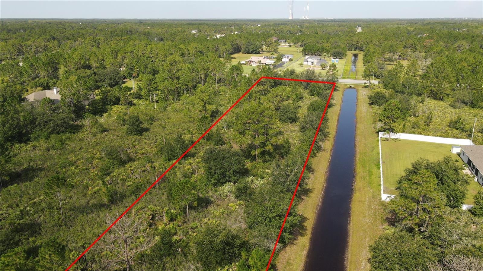 Here is a huge opportunity for a 2+ acre lot located only 20 minutes from the airport, about 30 minutes from the beaches, about 15 minutes to major shopping and dining and a voluntary HOA with only minor recorded deed restrictions. This lot has 2.53 acres with only .03 acres of designated wetlands located in the rear of the lot. You will have minimal to no utility costs as you will have well, septic, and if you choose solar, very inexpensive utility costs. Homes start at 1750 sq feet up to and over 10,000 sq feet. The price of land in this area has grown exponentially over the last few years with some lots up over 300% in last 5 years. Now is the time to buy land as there is no more being made and neighborhoods with estate sized lots located so convenient to major development is a rare find in Central Florida. In Wedgefield, you can have your horse, and in some cases farm animals. Buyer should check with Orange County for recorded deed restrictions. The listing agent is the only Accredited Land Consultant serving Wedgefield and can thoroughly educate buyers on exactly what can be built and even find the perfect builder for your future home. This property already has it's survey, soil report, wetlands report, and CAD with Orange County. These reports alone are over a $6000 value provided with the purchase of the land by the seller.