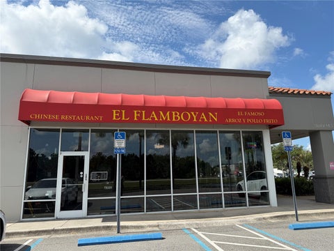 Photo of 12141 S Orange Blossom Trail, Orlando, FL 32837 (MLS # O6429038)