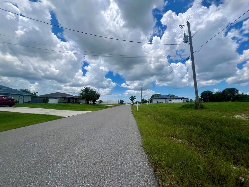 Photo of 1423 NW 8th Terrace, Cape Coral, FL 33993 (MLS # C7514531)