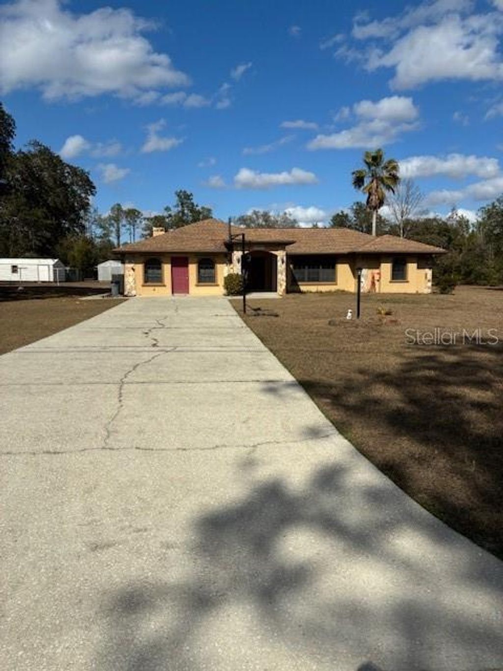 Photo of 20929 SW Audubon Avenue, Dunnellon, FL 34431 (MLS # OM717363)
