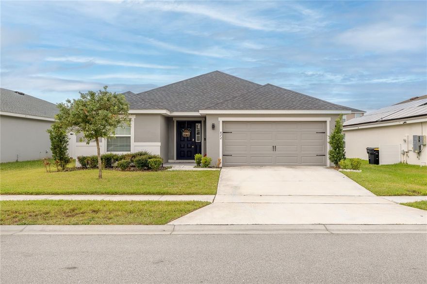 Short Sale. This beautiful, nearly new (2022) single-family home offers you a luxurious living experience, where upon entering you will feel the spaciousness of the open concept, with a great room, vaulted ceilings, and upgraded features throughout. Enjoy vinyl plank flooring, stainless steel appliances, quartz countertops, and a tile backsplash that provides the perfect contrast in the open kitchen. The spacious master suite includes a coffered ceiling and dual walk-in closets. Outside, relax on the covered and screened back porch. Astonia community amenities include a resort-style pool, playground, dog park, and scenic conservation areas. INVESTMENT/HOME OPPORTUNITY IN DAVENPORT! This property offers the perfect blend of tranquility and accessibility. Located near major roads, just a short drive to the theme parks and ChampionsGate. Ideal for first-time home buyers or investors seeking value in Central Florida.