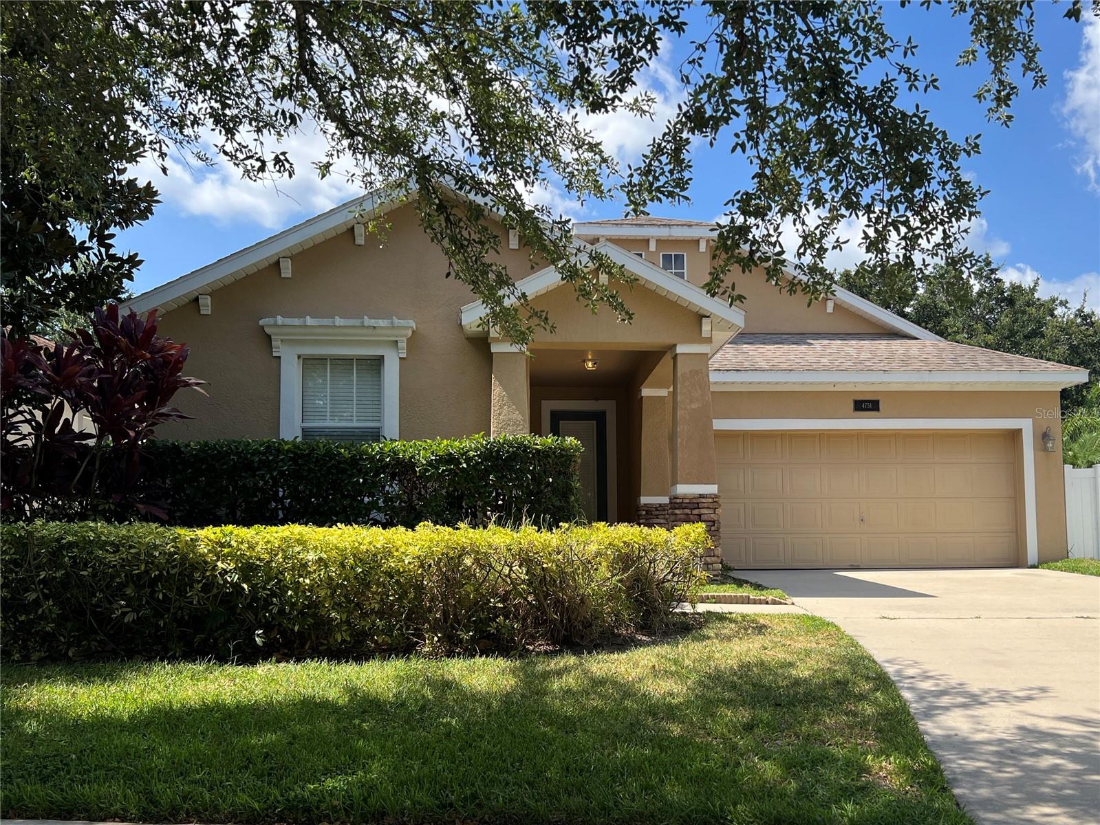 Stunning 4-bedroom, 3-bathroom home located in the highly sought-after Summerport community. This property showcases all the prime features you’d expect. From the charming front porch, enjoy a peaceful view of the community pond. Summerport, where location is everything, as great schools are nearby and you’re just minutes away from the community pool, tennis courts, basketball court, fitness center, clubhouse, and dock on Walsh Pond! This home offers new carpet throughout and fresh new paint. Privacy-fenced backyard with a large screened room, great for entertaining your guests. The kitchen features a gas stove, ample cabinets for storage, spacious countertops for all your food prep needs, and a large pantry/laundry room. The primary bedroom features a large walk-in closet and a spacious bathroom with a garden tub. Don't miss out on this beautiful home call today for your private tour.
