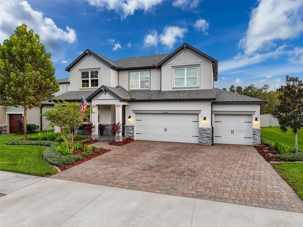 Photo of 11828 Ranchers Gap Drive, Odessa, FL 33556 (MLS # TB8480685)