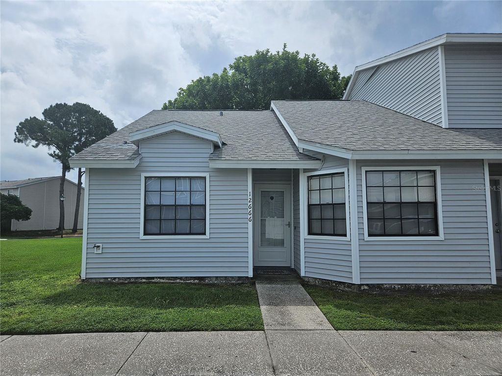 Photo of 12666 Castle Hill Drive, Tampa, FL 33624 (MLS # TB8430288)