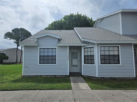 Photo of 12666 Castle Hill Drive, Tampa, FL 33624 (MLS # TB8430288)