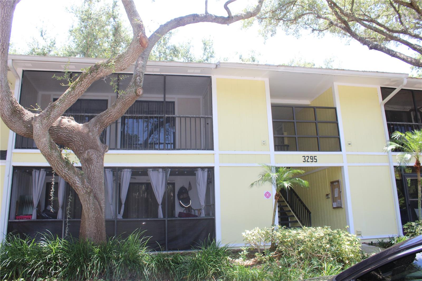 Explore this 1-bedroom, 1-bathroom condo on the second floor of the desirable Fox Chase community in Palm Harbor. This residence showcases an open floor plan which features a spacious living room that opens through sliding doors to a generously sized lanai, perfect for enjoying that morning cup of coffee, or evening cocktail. There is a fully equipped and recently renovated kitchen, complete with newer cabinets, a designer backsplash, and sleek stainless-steel appliances. Adjacent to the kitchen is a good-sized dining area, ideal for intimate dinners or hosting friends. The entire condo is accented with newer laminate flooring. The master bedroom offers a large walk-in closet and sliding doors leading to the lanai, allowing natural light to fill the room. Added conveniences include a laundry closet equipped with a full-sized washer and dryer, making laundry days a breeze. Ideally located, this condo offers proximity to shopping centers, restaurants, Gulf beaches, and entertainment venues. Enjoy all the amenities Fox Chase has, including a community pool, tennis courts, a basketball court, shuffleboard, pickleball, bocce ball, and a clubhouse with billiards, and a fitness area. Experience the perfect blend of convenience, comfort, and community at Fox Chase.