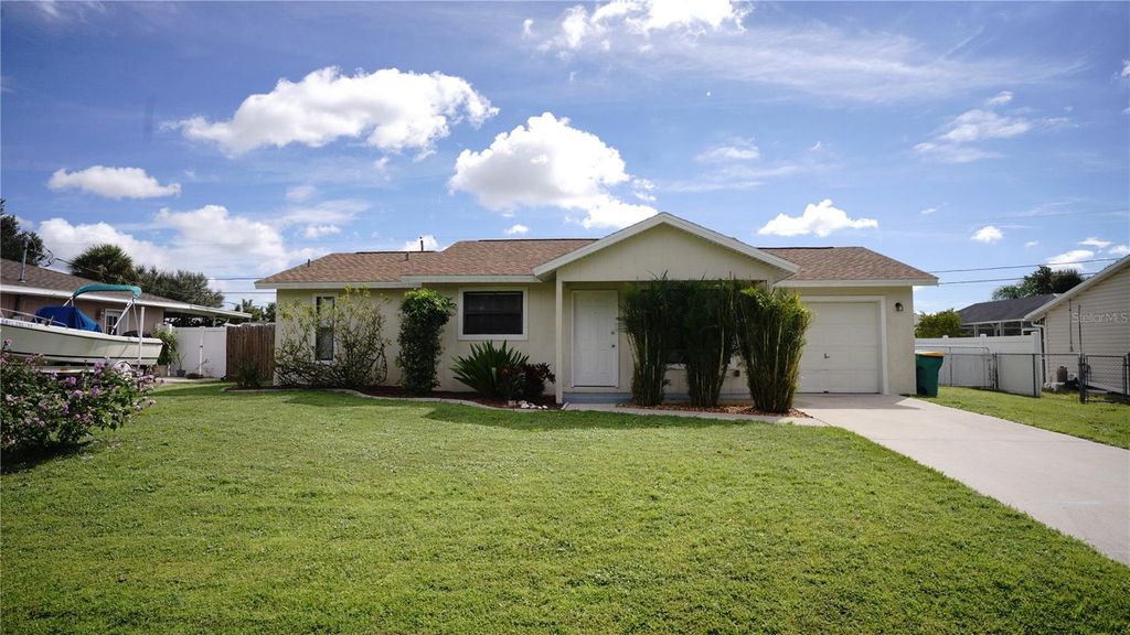 Photo of 304 Fletcher Street, Port Charlotte, FL 33954 (MLS # O6348180)