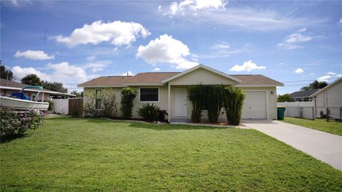 Photo of 304 Fletcher Street, Port Charlotte, FL 33954 (MLS # O6348180)