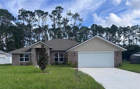 Photo of 39 Birchwood Drive, Palm Coast, FL 32137 (MLS # FC318002)