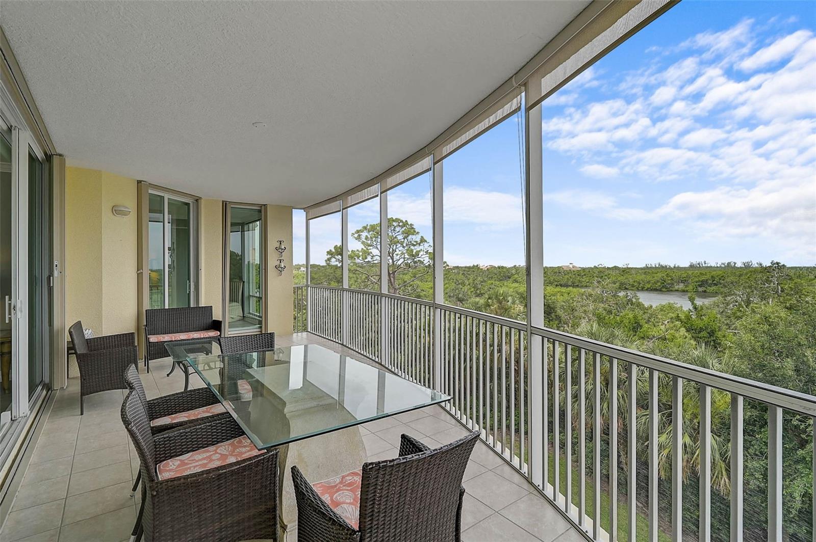 **STUNNINGLY UPDATED CONDO with Breathtaking Water & Preserve Views that rival those of higher floors!** This LARGE, CORNER UNIT of nearly 2800sf features 3-Beds & 3 Full Baths PLUS Study/Den (or possible 4th Bedroom with Walk-In Closet) and 2 Covered Parking Spaces and is located behind the Secure Gates of the highly sought after Oaks-Preserve, Country Club neighborhood. As you emerge from your private elevator foyer entrance, you will be enthralled by the Stunning View of Little Sarasota Bay and the Gulf of Mexico. The brilliantly RENOVATED, Light and Bright interior boasts a spectacular Kitchen with large waterfall island with seating area, Quartz countertops and Newer Stainless-Steel appliances, while other premium features include Plantation and Hurricane Shutters, Luxury Vinyl Plank and tile flooring, Crown moldings, Updated bathrooms with Quartz counters, etc. The Owner’s Bedroom Suite features a Walk-in Closet, Custom Tiled Shower, Soaking Tub and Dual Vanities. The Spacious Balcony offers an ideal western exposure for enjoying gorgeous sunsets! This residence offers 2 Assigned Parking Spaces and a Climate-controlled Storage unit. This MERIDIAN I Condo Tower boasts a New Roof (2024) and New Elevators (2025 – in progress). Meridian Condo residents enjoy private amenities including Heated Pool & Spa, Fitness and Outdoor Grill in addition to The Oaks Club’s main campus of amenities. THE OAKS is a distinguished, 24hr Guarded, Country Club Community which boasts many accolades including: Platinum Club of America, Emerald Club of the World, Elite Distinguished Club of the World and One of America’s Healthiest Clubs - where amenities include Three Restaurants, Ballroom, Two 18-hole championship GOLF courses, award-winning RACQUETS program with 12 Har-Tru Hydro-Grid TENNIS courts, 4 PICKLEBALL Courts, wonderful CROQUET facility, state-of-the-art FITNESS center and junior Olympic, heated community SWIMMING POOL, Bocce, Basketball Court, Playground and more! The Oaks is just minutes from nationally ranked Pine View School, the Legacy Bike Trail, area Beaches and all that Gulf Coast living has to offer. Membership is required and there is NO WAITLIST for GOLF or SOCIAL Membership. **PLEASE ENJOY VIEWING the 3D VIRTUAL TOUR**