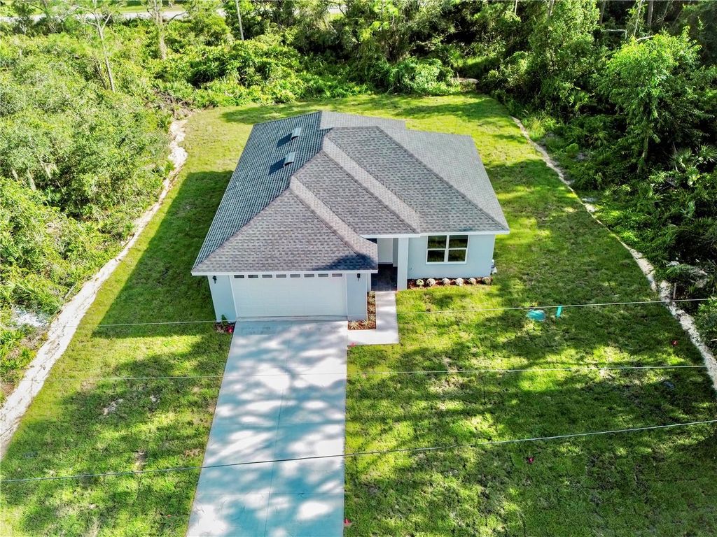 Photo of 454 Bonnie Road NW, Lake Placid, FL 33852 (MLS # O6350554)