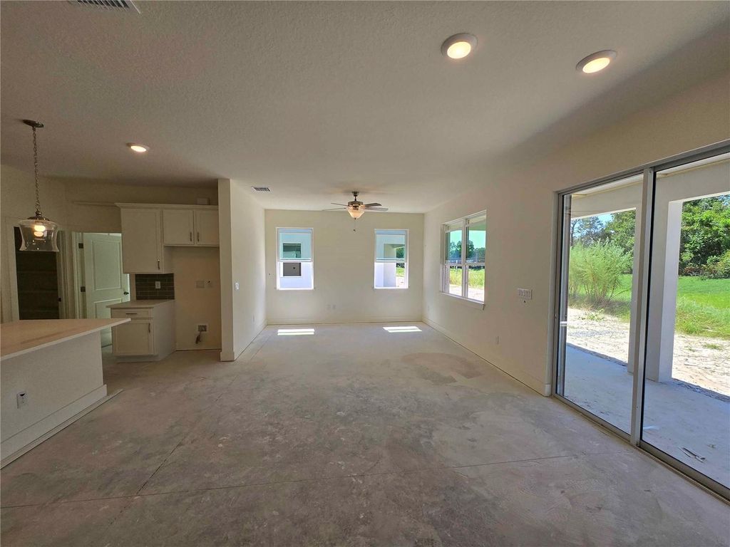 Photo of 7 Daybreak Run Loop, Spring Hill, FL 34609 (MLS # R4909946)