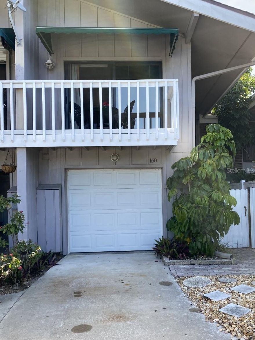 Stunning Waterfront Town home with Boat slip and access to the intercoastal waterway! This home has beautifully upgraded, with high end details.  This unit features 3 Bedrooms and 2.5 bath, 2 Master Suites.  Beautiful waterfront views from Living/Dining/Kitchen and Master Bedroom.  Balconies off both bedrooms.  Upgrades are numerous!  Enjoy your dream Kitchen with with custom cabinetry, stainless appliances, granite counters and views of the waterway while you cook!  Custom upgrades include Crown Molding, Central Vac., Hurricane Shutters,  Wood Burning Fireplace, Recessed Lighting,  Custom Closets, Jucuzzi Tub, Golf Cart Garage, New A/C and much much more.  Centrally located between Canal St. and Flagler Ave.  Don't miss out on your piece of PARADISE! ;Water: City