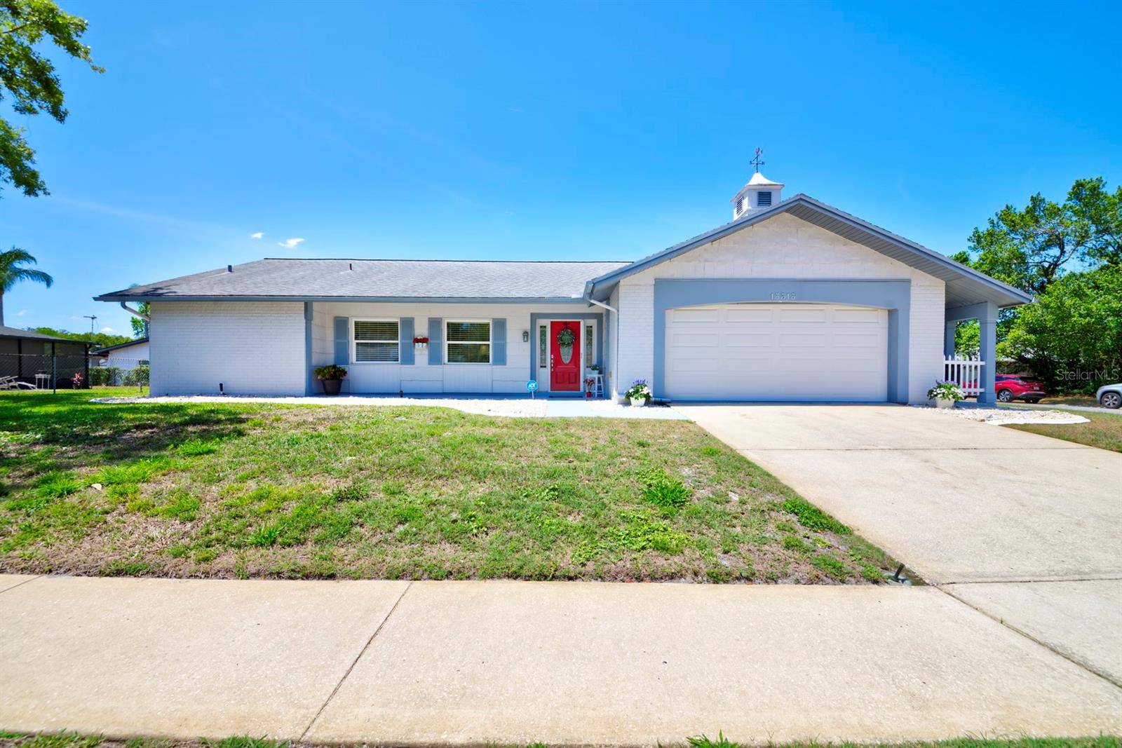 Very Very Well-maintained PET FREE & SMOKE FREE remarkable and Truly Move-In Ready CONCRETE BLOCK home in Ravenswood Village & a Community Pool. This seller is required to relocate and is HIGHLY MOTIVATED to sell. 1579 Sq.Ft. 2 bedrooms possible to make (3) /2 bath/2 car garage with a service entry door. Come take a look at how this home is being used as a three (3) bedroom currently. Oversized Handicap-accessible shower in the guest bathroom. Interior Laundry Room and Washer & Dryer will stay. Lots of potential and options! Pet-free, ceramic tile throughout. The Homeowner has taken such very good care of this home and maintained everything you could think of. Not only is it beautiful but you won't have to worry about sprucing anything up right away! The Master Bathroom has a Hydrotherapy tub to soothe and relax you after a long day! Then relax on the Lanai for some fresh air before bed. The kitchen has a service window to the lanai for easy service for Cocktail Hour or those wonderful BBQ'S. The kitchen even has a trash compactor. Outside the Lanai is a concrete patio for the grill. The attic has easy access with a very sturdy metal Werner Attic Ladder for ease of extra storage and there are hurricane straps at the end of each rafter in the attic. The attic also has a solar-powered exhaust fan to pull out hot air to improve energy efficiency. The Garage is oversized for storage. The rain gutters have leaf guards on them to help with limiting debris. The A/C has a UV PLATINUM SYSTEM that was installed in May 2021 to reduce DUST and help with SUPERIOR AIR QUALITY throughout the home. A/C is serviced twice a year and the seller had a tune-up and replaced the UV bulb in January 2023. The A/C Blower Motor was replaced in March 2023. There is also a One (1) year Maintenance Plan for the A/C included and transferrable to the new owners. A/C was new in 2010. The Roof was replaced in 2012. New Tankless Water Heater was installed in October 2017. The Garage Door was replaced in 2012, Garage Door Spring, and Bearings were replaced Feb. 2023. New beautiful Plank Tile Flooring was laid in 2020. The Pump for the Sprinklers was replaced in 2020. The Water Softener was replaced in 2018. The Washer was new in 2019. New Blinds throughout the home in 2022. Indoor/Outdoor Carpet was installed on the Lanai in 2021. The Rock landscaping around the perimeter of the house was done in 2020. Freshly painted beautiful Landscape Curbing in April 2023. All freshly painted trim, walkways, garage floor, and front door March 2023. Ravenswood Village offers a Community Club House, Community Pool, Shuffleboard, Tennis Courts, Handball Courts, Basketball & Table Tennis. This Community offers classes like Yoga, Tai Chi, Art Class, Bridge, Canasta, Pinochle, Dominoes, Knitting & Knitting for Charities, and Yarns & Crafts. Visit the community website at www.bweha.org for more information. Lots of activities to take advantage of if you desire. if you are looking for a truly move-in ready home, this one is truly move-in ready! Scroll to the bottom for more information and give us a call today to schedule your private showing of this fabulous home! You will truly be impressed with the quality of this home!