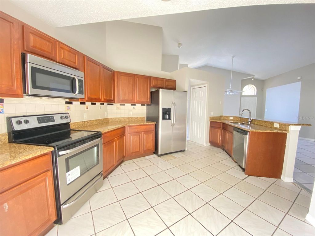 Photo of 209 Cheshire Court, Kissimmee, FL 34758 (MLS # O6368923)