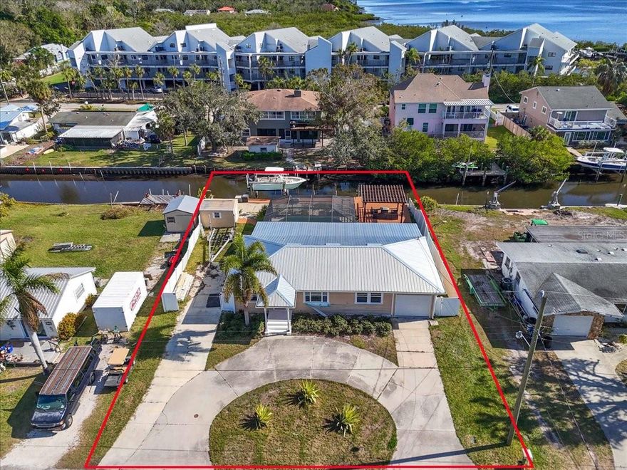 Short Sale. *POSSIBLE SHORT SALE* WATERFRONT DIAMOND IN THE ROUGH JUST SECONDS TO THE RIVER! Priced at land value, this property can be used to build the home of your dreams from the ground up, or bring your vision and recreate a home with the current structure. Home sustained flood damage in 2024 and has since been professionally remediated. While the inside is ready to finish, many elements remain in fabulous condition including a new 2024 METAL ROOF, 2023 HVAC, 2016 BOAT LIFT/DOCK with Timbertech composite and PVC decking, and a quintessential Florida swimming pool. In addition, impact windows and sliders were upgraded at the rear of the home, and pool equipment was replaced less than 2 years ago (heater has not been used since storm). Large circular driveway and ADDITIONAL paved parking on the side of the home. Have an EV? The home already prewired with an outlet. Ideal location convenient to downtown Bradenton, Ellenton shopping, St. Petersburg, the vibrant Sarasota area, easy access to 3 airports, I-75, and world famous beaches and fishing! No need to get in your car...just lower your boat and spend the day on the water. Great investment spot for water enthusiasts looking for a more central location that puts you close to just about everything.