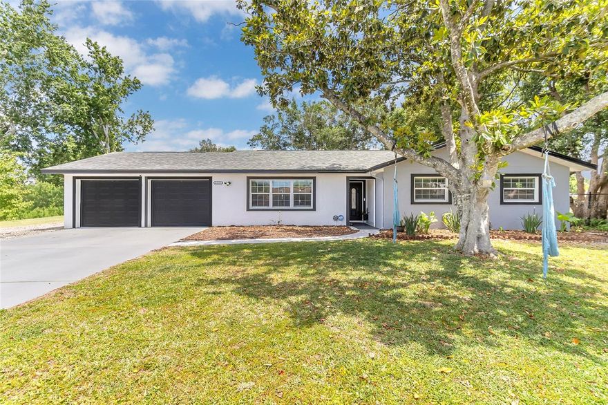 Welcome to 425 Wisconsin Avenue in the heart of St. Cloud, Florida—a beautifully renovated, move-in ready single-story home with no HOA and no CDD. Situated on an oversized 0.34-acre lot, this 3-bedroom, 2-bath home also features a versatile flex room that can be used as a family room, office, or additional living space. Thoughtfully updated in 2024, this home showcases a newer roof, AC system, water heater, windows, trim, blinds, modern light fixtures, and a stylish electric fireplace. Step inside to discover gorgeous new flooring throughout and a fully updated kitchen complete with stainless steel appliances, granite countertops, and an oversized island—perfect for entertaining. The bathrooms have been elegantly upgraded with quartz countertops, offering a clean and contemporary feel. Ideally located just minutes from East Lake Tohopekaliga and Lakefront Park, you’ll enjoy easy access to the beach, fishing pier, walking trails, playgrounds, and some of St. Cloud’s favorite local restaurants. Commuting is a breeze with Narcoossee Road and the Florida Turnpike only about 3 miles away, while downtown St. Cloud is just a short drive, offering charming shops, dining, and local community events.