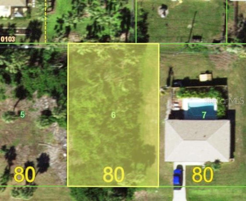 Photo of 434 Garfield Avenue NW, Port Charlotte, FL 33952 (MLS # O6428533)