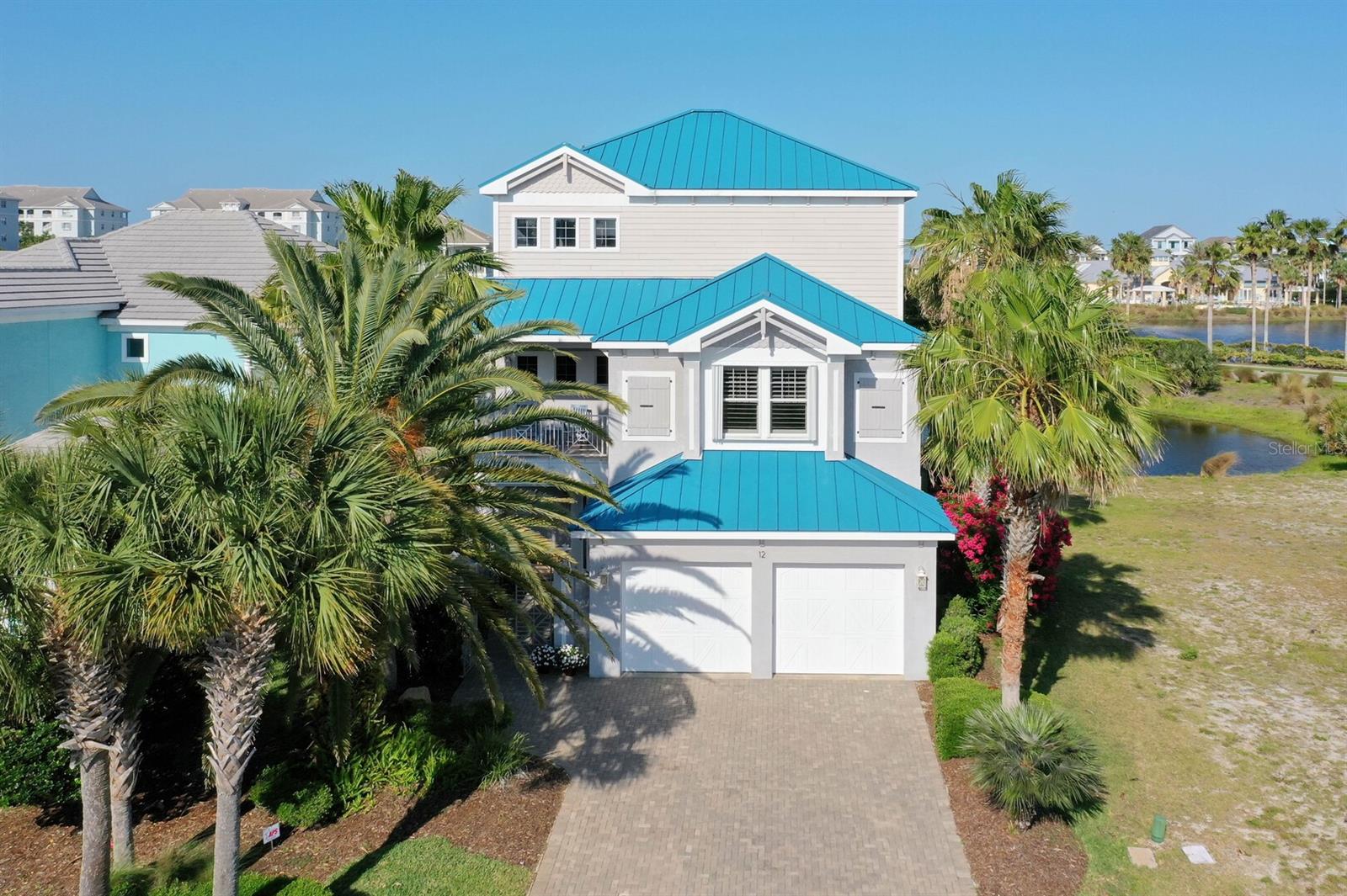 Spectacular Oceanfront Living in a Gated Community
Welcome to the epitome of luxury and coastal elegance. This stunning, fully furnished, three-story home is nestled within the beautiful and serene, guard-gated community of Cinnamon Beach which is located in Ocean Hammock, offering unparalleled security and privacy with 24-hour manned entry.
Designed for easy living and seamless entertaining, this concrete block masterpiece boasts an elevator for effortless access to all floors. Each level offers breathtaking views and a sense of tranquility, making it the perfect escape.
Currently operating as a short-term rental, this property presents a unique and lucrative opportunity for investors. Whether you're seeking a dream home for yourself or a high-performing asset, this residence is perfectly positioned to deliver a premium lifestyle. Its prime location provides quick and easy access to the ocean, allowing you to enjoy all the beauty and recreation of coastal living just steps from your front door.