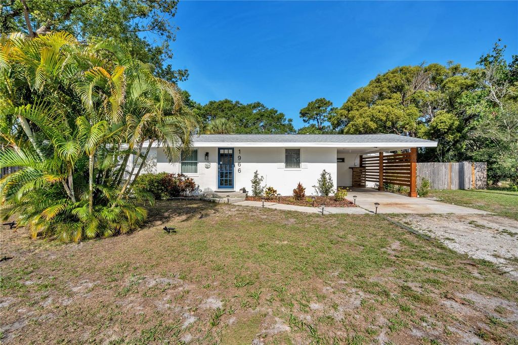 Photo of 1966 Trotter Rd, Largo, FL 33774 (MLS # TB8507089)