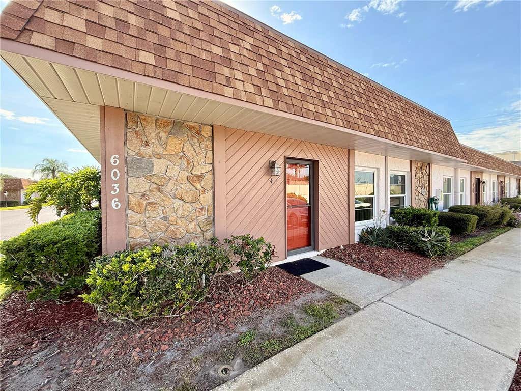 Photo of 6036 Chesham Drive #4, New Port Richey, FL 34653 (MLS # TB8535656)