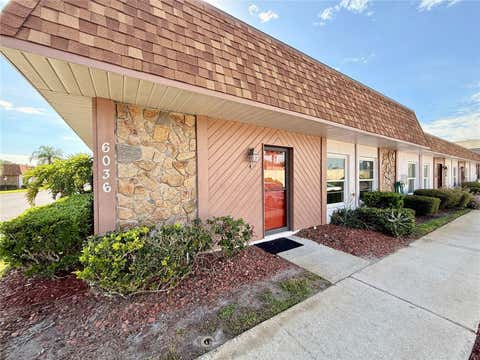 Photo of 6036 Chesham Drive #4, New Port Richey, FL 34653 (MLS # TB8535656)