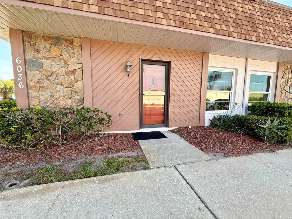 Photo of 6036 Chesham Drive #4, New Port Richey, FL 34653 (MLS # TB8535656)