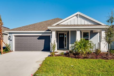 Photo of 49 Oconee Drive, Palm Coast, FL 32137 (MLS # O6220134)