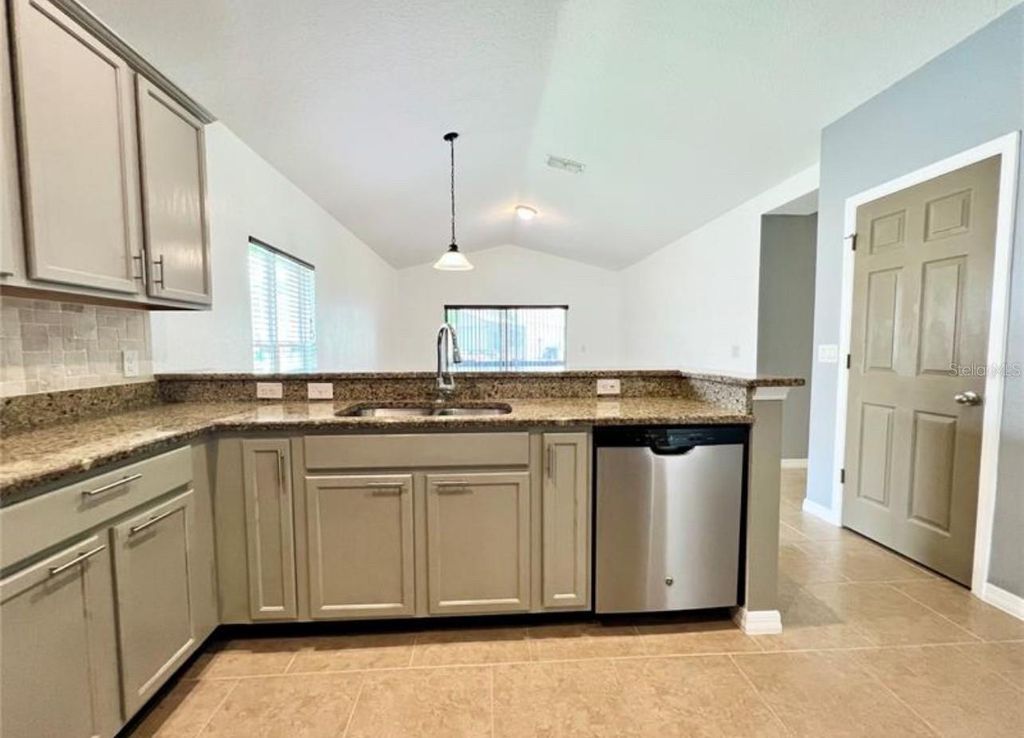 Photo of 959 Andalusia Loop, Davenport, FL 33837 (MLS # S5139406)