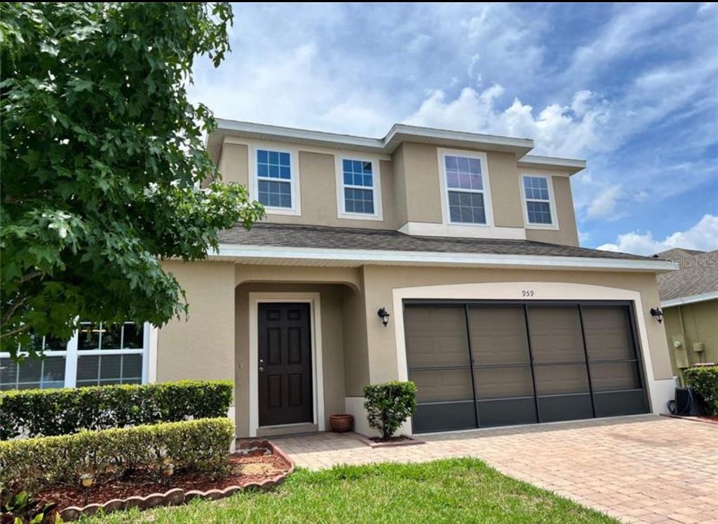 Photo of 959 Andalusia Loop, Davenport, FL 33837 (MLS # S5139406)