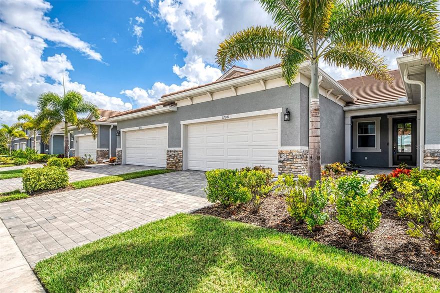 Better than new!  This beautiful villa comes turn key, featuring 3 bedrooms, 2 baths, dedicated laundry room, and 2 car garage - plenty of space for entertaining family and guests.  The front entry leads to an open-concept great room combining kitchen, dining and living room areas – all overlooking the screened lanai through expansive three-panel sliding doors that fill the space with light.   Lofty 9’4” ceilings add to the homes bright, airy feel.  Upgrades include tray ceiling in the primary bedroom, custom closets, lighting, refrigerator, washer and dryer, blinds and window treatments, EcoBee smart thermostat, ring doorbell and keyless entry.    Your HOA covers lawn care, irrigation, roof maintenance, exterior painting, cable and internet, leaving you plenty of free time to walk a block to the new Amenity Center.  There you will experience resort style living including a beach-entry pool with lap lanes, spa, fitness center, club house, pickleball and bocce courts, fire pit, grilling station, event lawn, playground and dog park.  For more added entertainment you are around the corner from Atlanta Braves Cool Today Stadium, Wellen Park, with its 80 – acre lake, scenic walking paths, dining, shopping, golf, entertainment and of course stunning Gulf Coast beaches are a short drive away. 
Schedule your private tour today—your Florida lifestyle starts here!