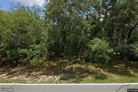 Photo of 6387 Pinehurst Drive, Spring Hill, FL 34606 (MLS # O6438443)