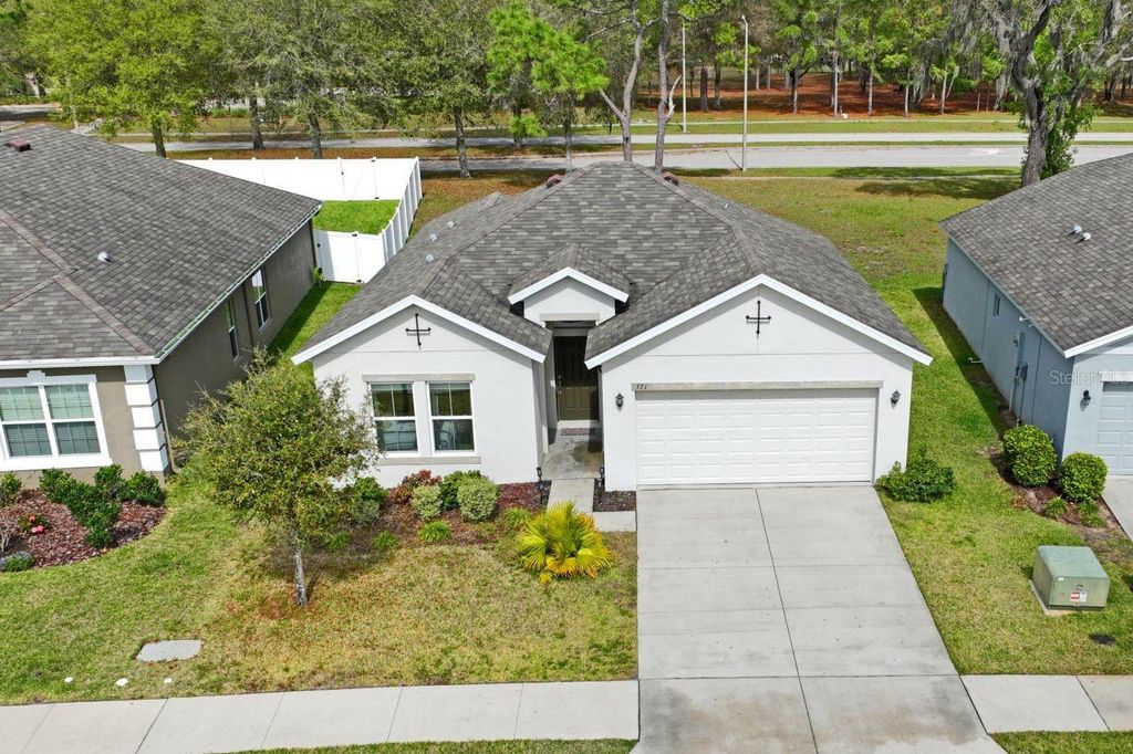 Photo of 571 Old Windsor Way, Spring Hill, FL 34609 (MLS # TB8461392)