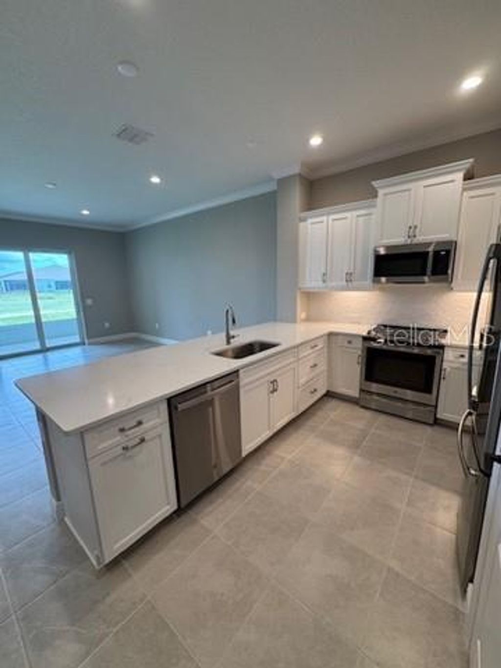 Photo of 24787 Buckingham Way, Port Charlotte, FL 33980 (MLS # A4668309)